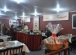 A mesa do Café Colonial conta com os produtos da indústria, entre outras iguarias