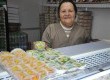 Cheia de orgulho, dona Magda exibe seus amuletos da sorte em homenagem a Seleção Brasileira de Futebol